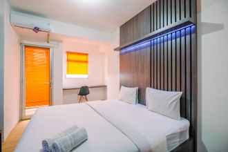 Bedroom 4 Homey and Minimalist Studio at Gunung Putri Square Apartment By Travelio