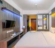 Bedroom 3 Comfort and Warm Living Studio Room at Gunung Putri Square Apartment By Travelio