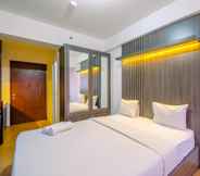 Bedroom 2 Comfort and Warm Living Studio Room at Gunung Putri Square Apartment By Travelio