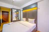 Bedroom Comfort and Warm Living Studio Room at Gunung Putri Square Apartment By Travelio