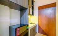 Common Space 5 Comfort and Warm Living Studio Room at Gunung Putri Square Apartment By Travelio