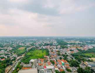 Exterior 2 Tidy and Homey Studio at Gunung Putri Square Apartment By Travelio