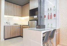 Common Space 3 Comfort and Elegant Stay 1BR at Gold Coast Apartment By Travelio