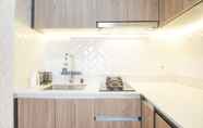 Common Space 4 Comfort and Elegant Stay 1BR at Gold Coast Apartment By Travelio