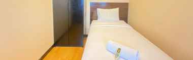 Bedroom 2 Homey and Simply 2BR at Braga City Walk Apartment By Travelio