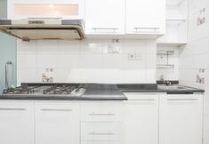 Common Space 6 Comfy and Fully Furnished 2BR Apartment at Gajah Mada Mediterania By Travelio
