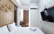 ห้องนอน 3 Nice and Fancy 1BR with Extra Room at Amartha View Apartment By Travelio