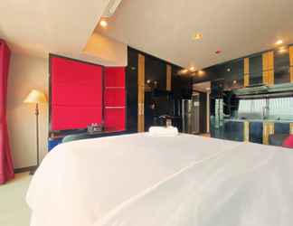 Bedroom 2 Comfy and Clean Studio Room at Tamansari La Grande Apartment By Travelio