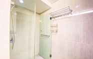 In-room Bathroom 3 Comfy and Clean Studio Room at Tamansari La Grande Apartment By Travelio