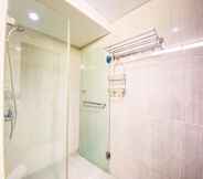 In-room Bathroom 3 Comfy and Clean Studio Room at Tamansari La Grande Apartment By Travelio