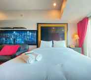 Bedroom 2 Comfy and Clean Studio Room at Tamansari La Grande Apartment By Travelio