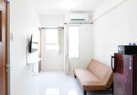 Common Space Homey and Modern 2BR at Puncak Kertajaya Apartment By Travelio