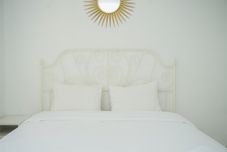 臥室 Homey and Strategic 2BR at Puri Garden Apartment near Mall By Travelio