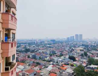 Bangunan 2 Homey and Strategic 2BR at Puri Garden Apartment near Mall By Travelio