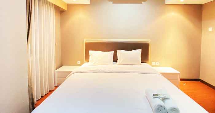 Bedroom Best City View 2BR at Apartment Tamansari La Grande By Travelio