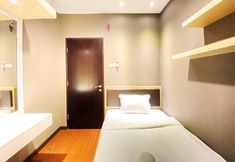 Bedroom 4 Best City View 2BR at Apartment Tamansari La Grande By Travelio