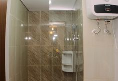 In-room Bathroom 2 Pleasurable 2BR at Apartment Transpark Juanda By Travelio