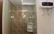 In-room Bathroom 2 Pleasurable 2BR at Apartment Transpark Juanda By Travelio