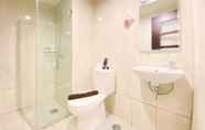 In-room Bathroom 2 Cozy Studio Room at Apartment Tamansari La Grande By Travelio