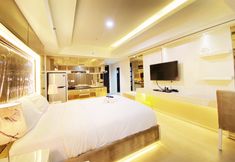 Bedroom 4 Cozy Studio Room at Apartment Tamansari La Grande By Travelio