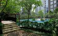 Swimming Pool 6 Cozy Living 2BR Apartment at The Mansion Kemayoran By Travelio