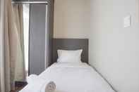 Bedroom Cozy Living 2BR Apartment at The Mansion Kemayoran By Travelio