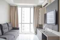 Common Space Cozy Living 2BR Apartment at The Mansion Kemayoran By Travelio