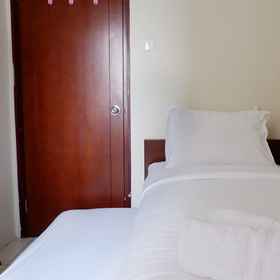 Bedroom 1 2BR Apartment at Mediterania Marina Residences with City View By Travelio, Sepuluh Sebelas Media Hotels