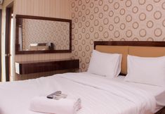 卧室 5 Cozy Studio Apartment at Lagoon Bekasi Town Square By Travelio