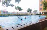 Swimming Pool 2 Cozy Studio Apartment at Lagoon Bekasi Town Square By Travelio