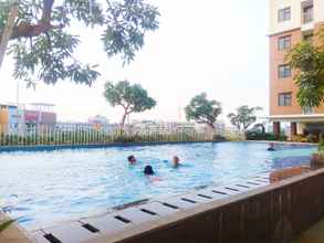 Swimming Pool 4 Cozy Studio Apartment at Lagoon Bekasi Town Square By Travelio