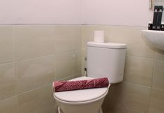 In-room Bathroom 7 Comfy and Stunning Studio Apartment Transpark Juanda By Travelio