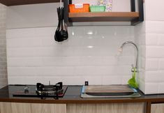 Common Space 6 Comfy and Stunning Studio Apartment Transpark Juanda By Travelio