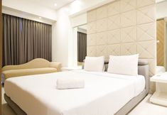 Bedroom 3 Spacious 2BR Apartment Connecting to Mall at La Riz Supermall Mansion By Travelio