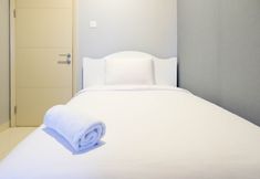 Bedroom 2 Spacious 2BR Apartment Connecting to Mall at La Riz Supermall Mansion By Travelio