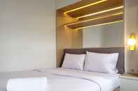 Kamar Tidur Cozy and Minimalist 2BR at La Hub City Apartment By Travelio