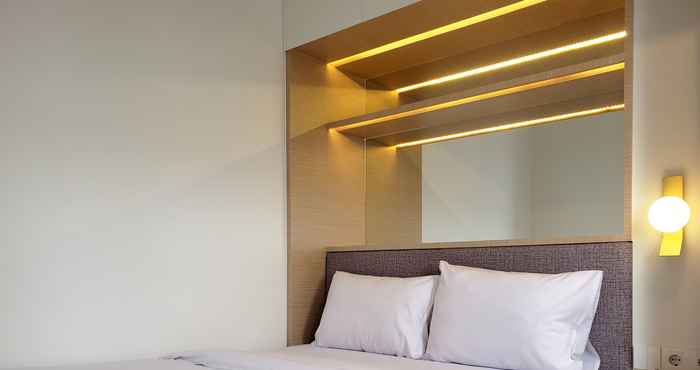 Bedroom Cozy and Minimalist 2BR at La Hub City Apartment By Travelio