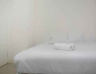 Bedroom 2 Strategic and Comfy 2BR at Bassura City Apartment By Travelio