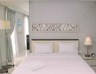 Bedroom 2 Cozy and Big Studio at Azalea Suites Apartment By Travelio
