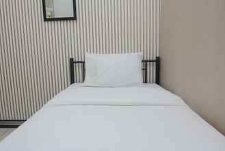 Bedroom 4 Comfortable and Fully Furnished Design 2BR Green Bay Pluit Apartment By Travelio