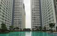 Swimming Pool 7 Great Deal 2BR at M-Town Residence Apartment near SMS Mall By Travelio