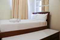 Kamar Tidur Elegant and Nice 2BR at Grand Palace Kemayoran Apartment By Travelio