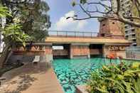 Kolam Renang Serene and Homey 2BR at Great Western Resort Apartment By Travelio