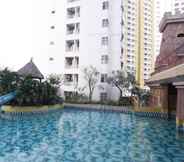 Swimming Pool 3 Serene and Homey 2BR at Great Western Resort Apartment By Travelio