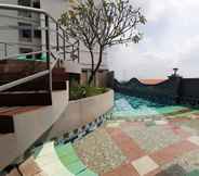 Exterior 4 Serene and Homey 2BR at Great Western Resort Apartment By Travelio