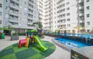 Swimming Pool 2 Cozy Living 1BR at Parahyangan Residence Apartment By Travelio
