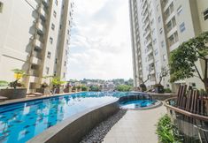 Swimming Pool 3 Cozy Living 1BR at Parahyangan Residence Apartment By Travelio