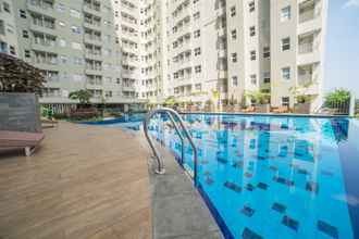 Swimming Pool 4 Cozy Living 1BR at Parahyangan Residence Apartment By Travelio