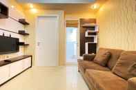 Common Space Cozy Living 1BR at Parahyangan Residence Apartment By Travelio