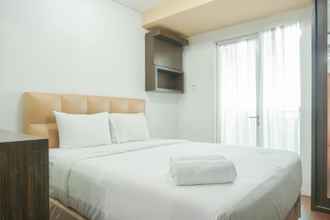 ห้องนอน 4 Cozy Studio at Woodland Park Residence Apartment By Travelio